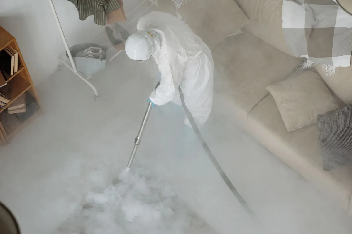 Biohazard cleanup technician in protective equipment, Abbeville, LA